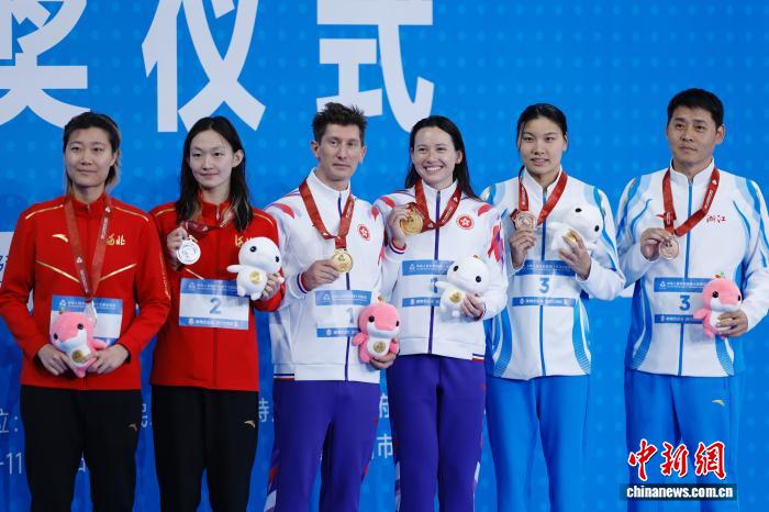 全运会赛场上的笑容：拼搏、传承与团结